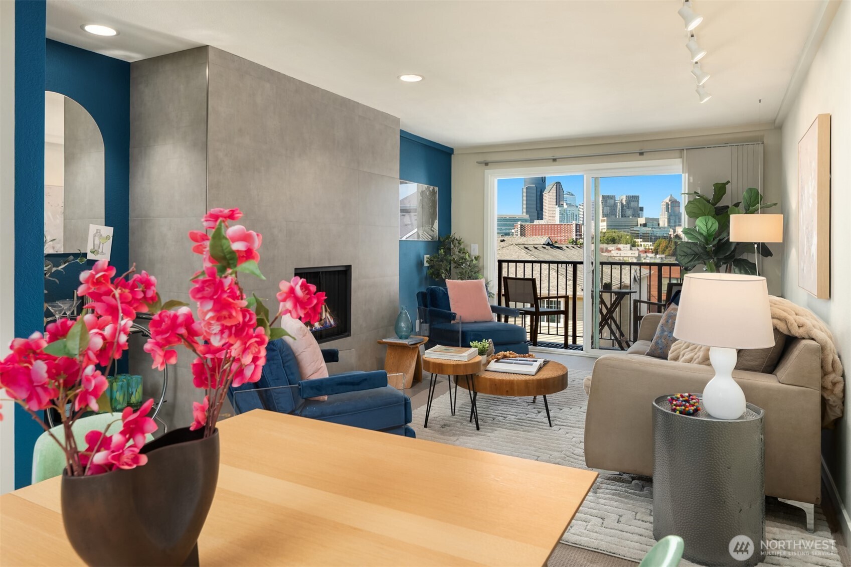 701 17th Avenue, Unit 305 Seattle, WA 98122 - Photo 5 of 36 a living room with furniture and flowers