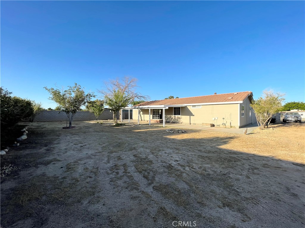 12546 Navajo Road Apple Valley, CA 92308 - Photo 16 of 27 Large back yard with gated/pull through RV parking.