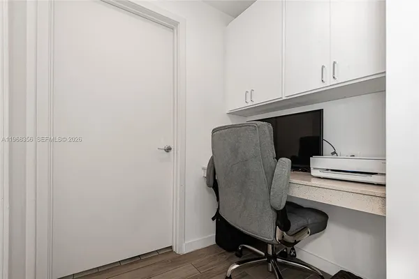 a view of entryway with wooden floor