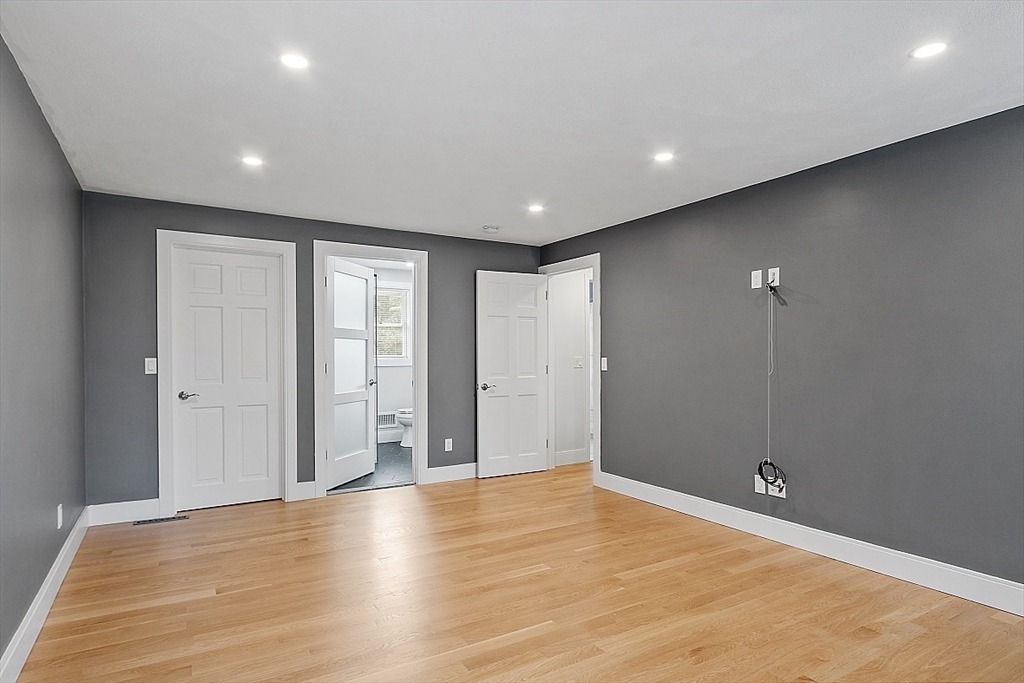 22 Coleman Road Groveland, MA 01834 - Photo 20 of 35 a view of a livingroom with an empty space and wooden floor