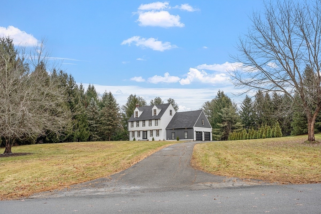 22 Coleman Road Groveland, MA 01834 - Photo 2 of 35 a view of swimming pool with a yard