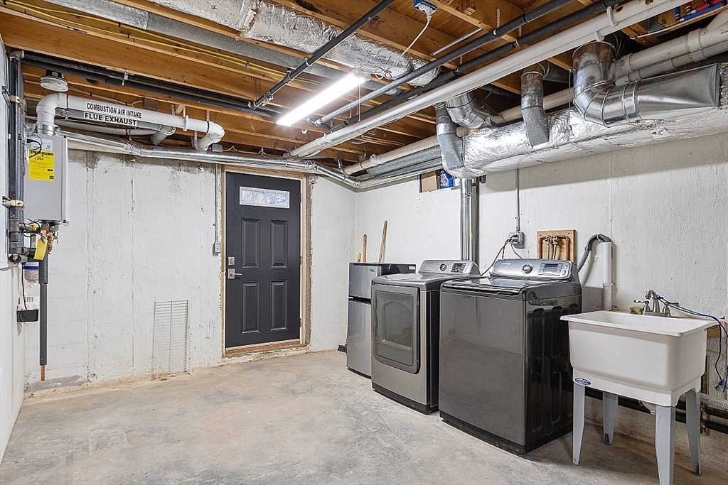 22 Coleman Road Groveland, MA 01834 - Photo 28 of 35 a utility room with dryer and washer