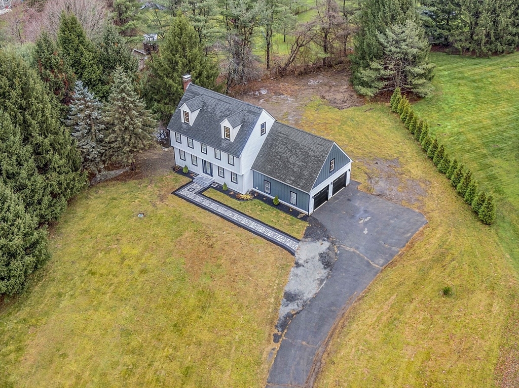 22 Coleman Road Groveland, MA 01834 - Photo 4 of 35 a aerial view of a house with swimming pool and sitting space