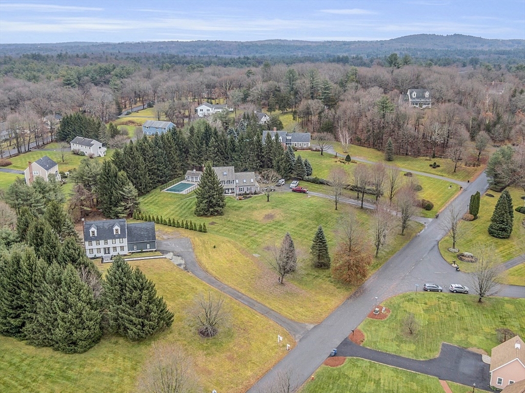 22 Coleman Road Groveland, MA 01834 - Photo 5 of 35 a view of a lake with a yard