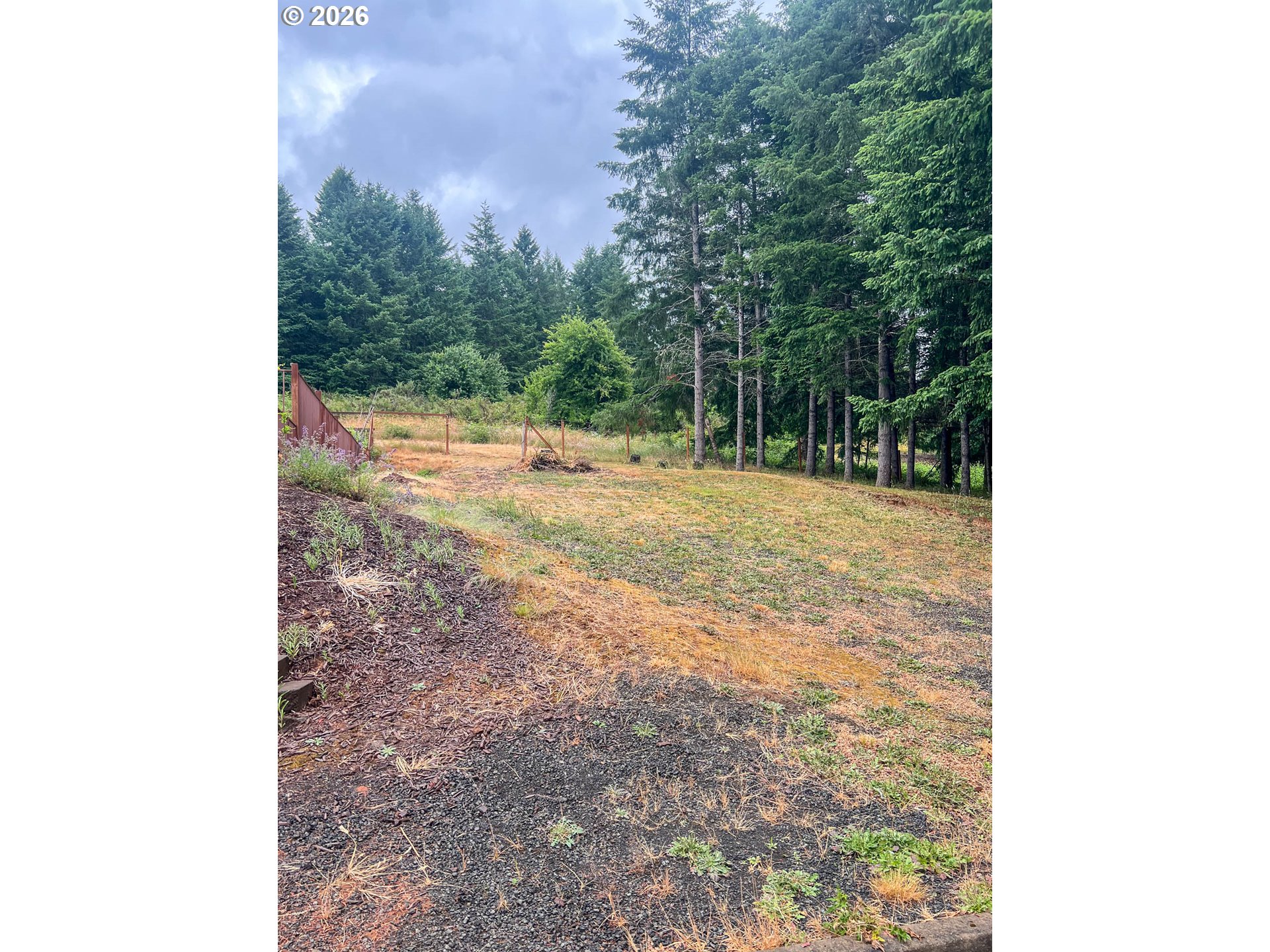 863 C Street Elkton, OR 97436 - Photo 5 of 7 a backyard of a house