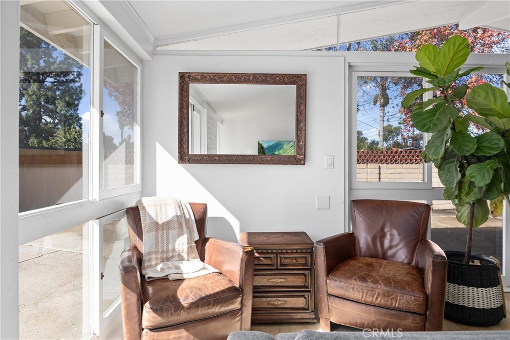 13062 Chaplet Place Tustin, CA 92780 - Photo 11 of 27 a living room with furniture flowerpot and a window