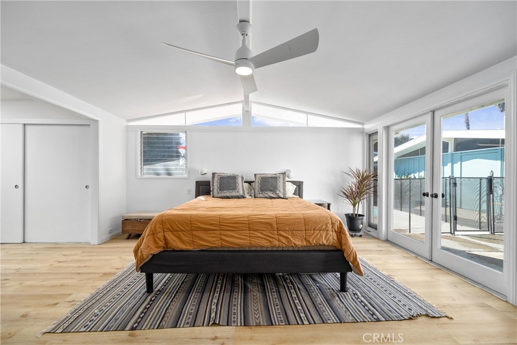 13062 Chaplet Place Tustin, CA 92780 - Photo 12 of 27 a bedroom with a bed and window