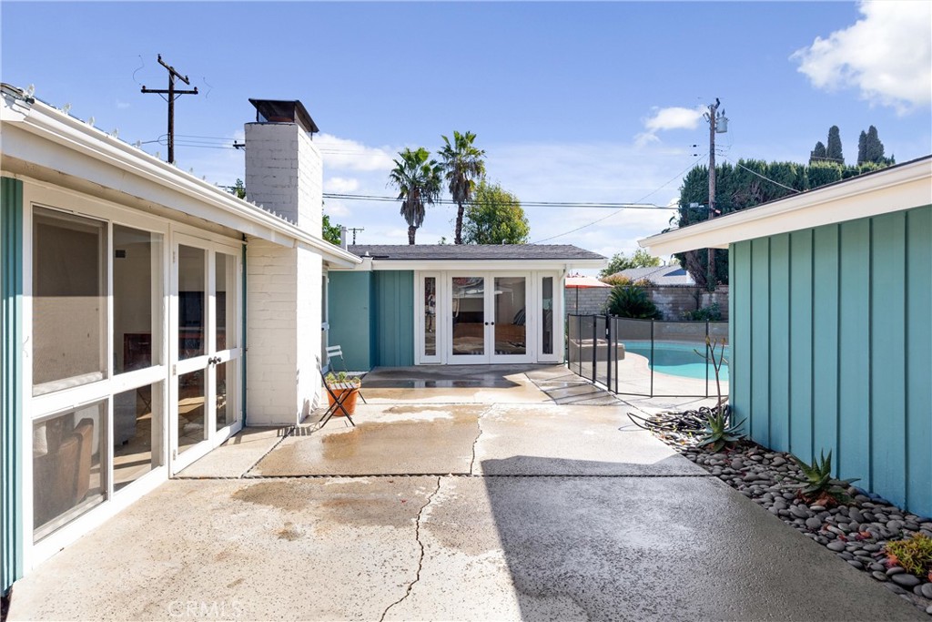 13062 Chaplet Place Tustin, CA 92780 - Photo 21 of 27 a outdoor view of a house with a porch