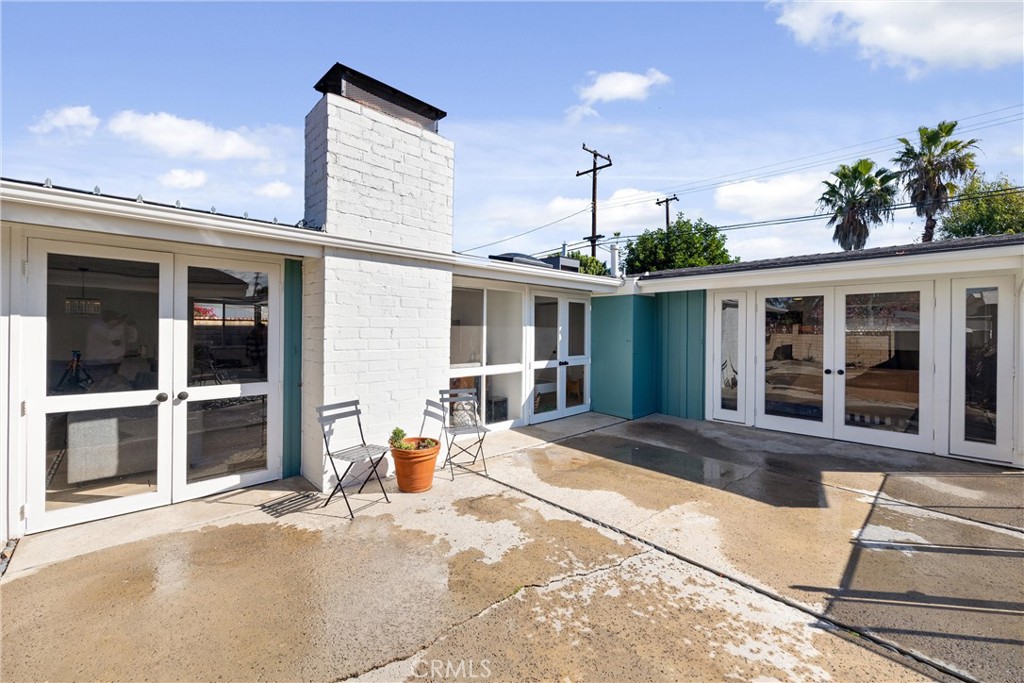 13062 Chaplet Place Tustin, CA 92780 - Photo 22 of 27 a front view of a house with a patio
