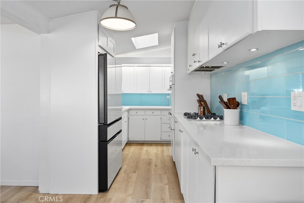 13062 Chaplet Place Tustin, CA 92780 - Photo 4 of 27 a bathroom with a sink and a mirror