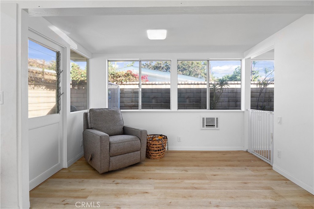 13062 Chaplet Place Tustin, CA 92780 - Photo 6 of 27 a living room with furniture and a large window