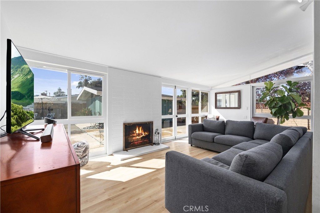 13062 Chaplet Place Tustin, CA 92780 - Photo 9 of 27 a living room with furniture and a fireplace
