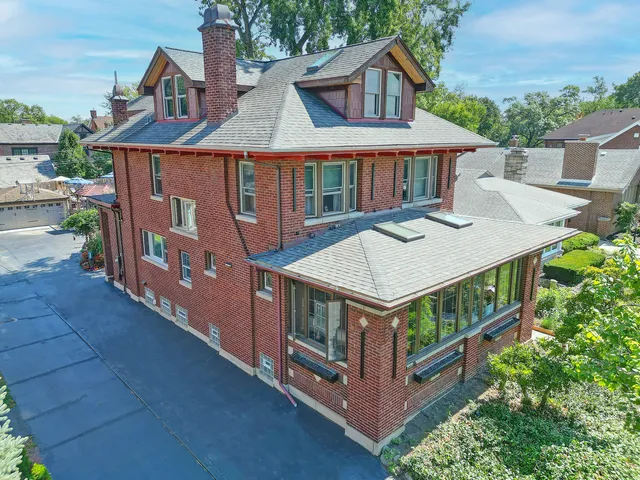 an aerial view of a house with balcony