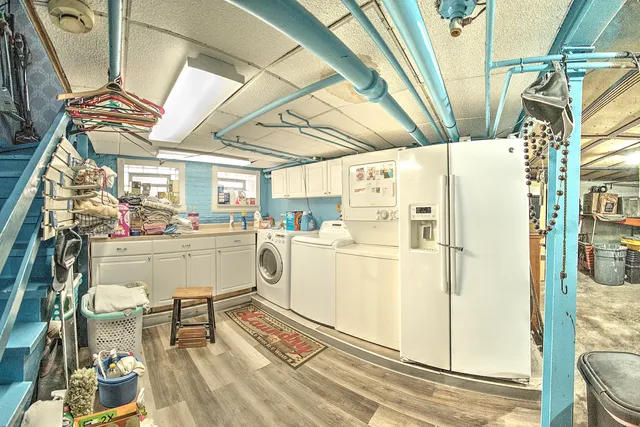 a view of a chair and tables in the parking space