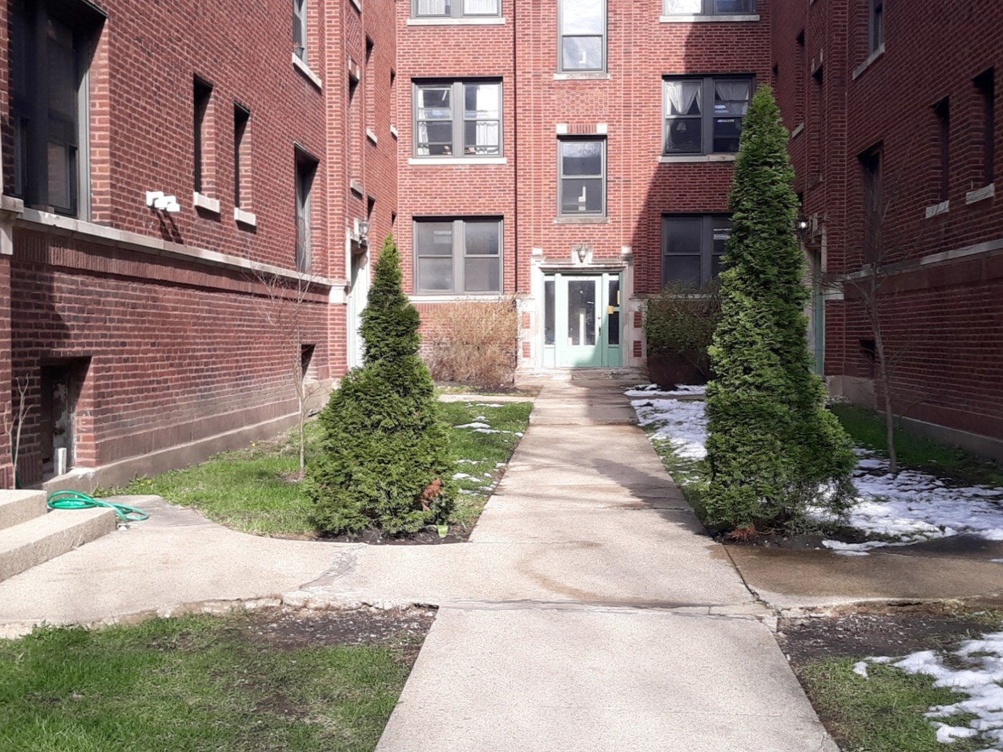 a view of a pathway both side of building
