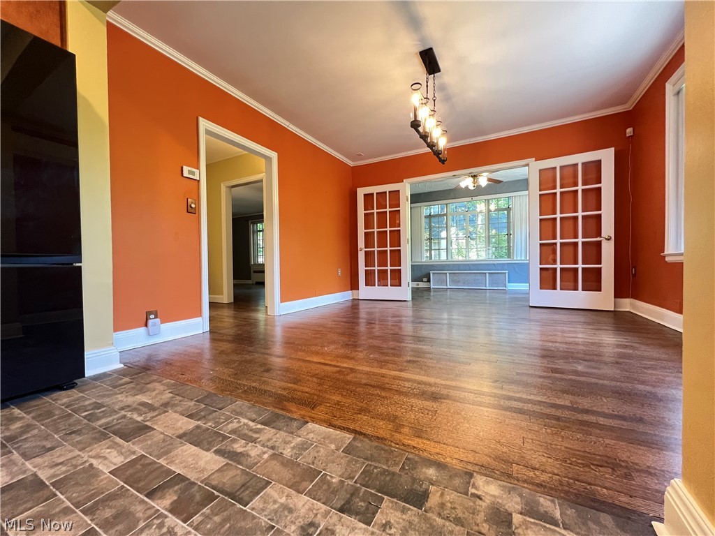 16287 Brewster Road Cleveland, OH 44112 - Photo 25 of 47 Dining area and sunroom from kitchen