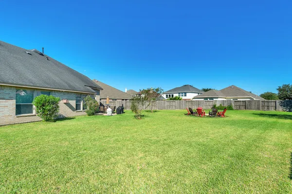 a view of a house with a big yard