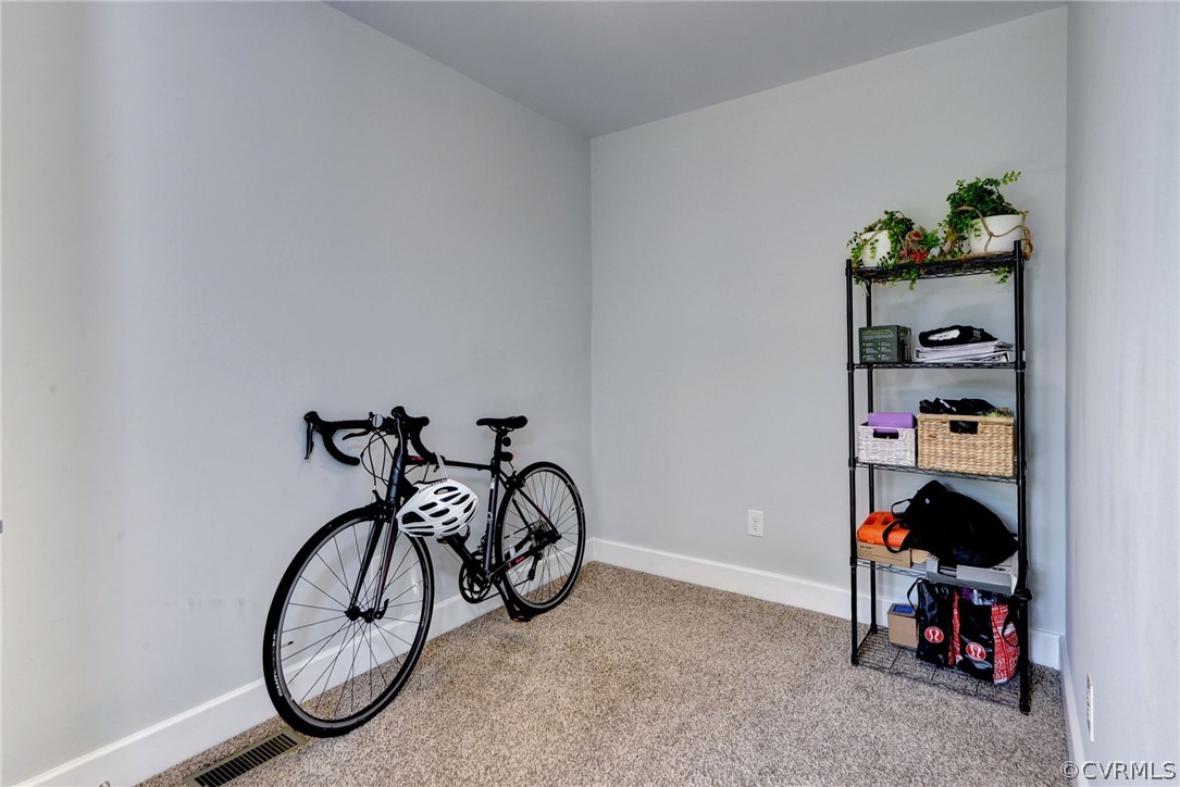 905 Lake Road Richmond, VA 23220 - Photo 20 of 50 a view of front door with wooden table
