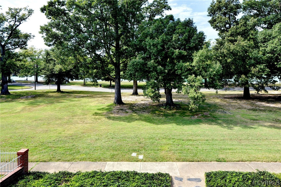 905 Lake Road Richmond, VA 23220 - Photo 26 of 50 a view of yard with swimming pool and green space