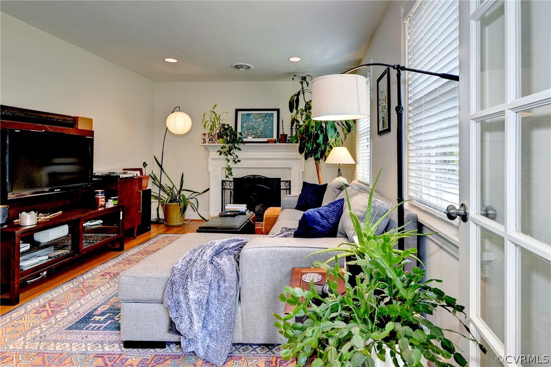 905 Lake Road Richmond, VA 23220 - Photo 31 of 50 a living room with furniture fireplace and flat screen tv