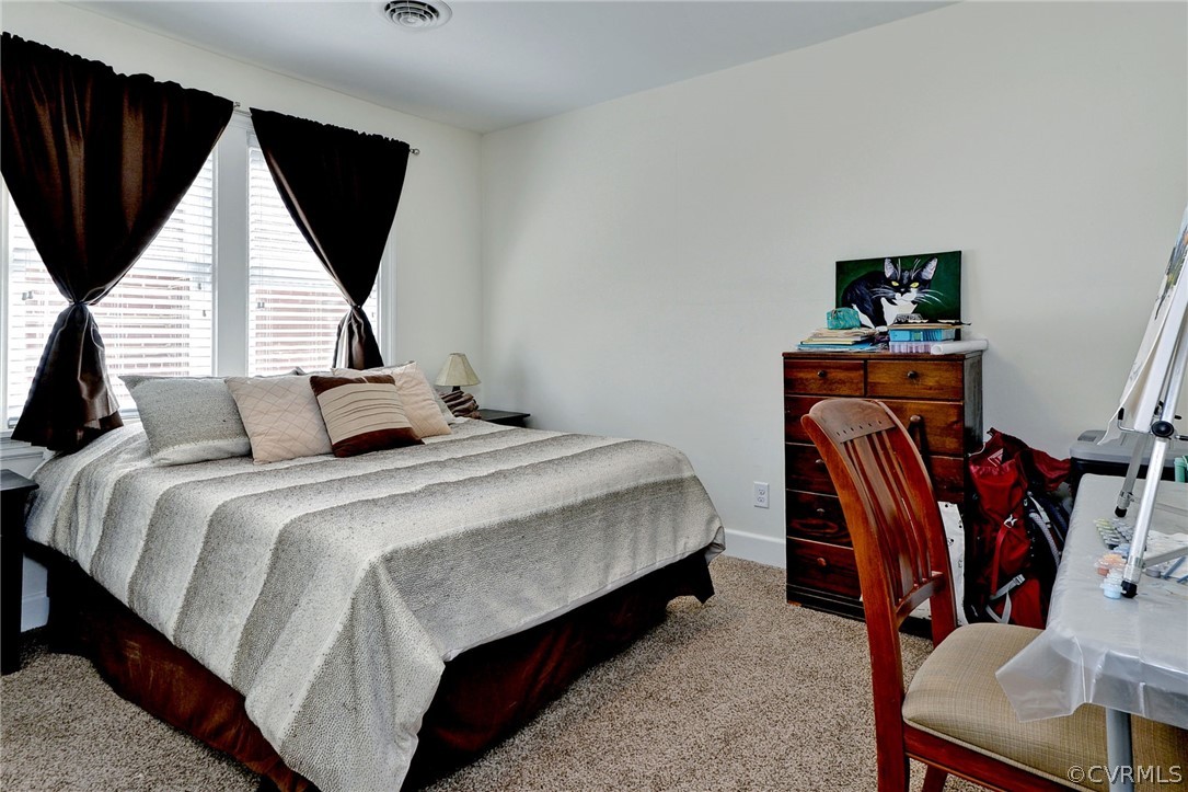 905 Lake Road Richmond, VA 23220 - Photo 40 of 50 a bedroom with bed and a window