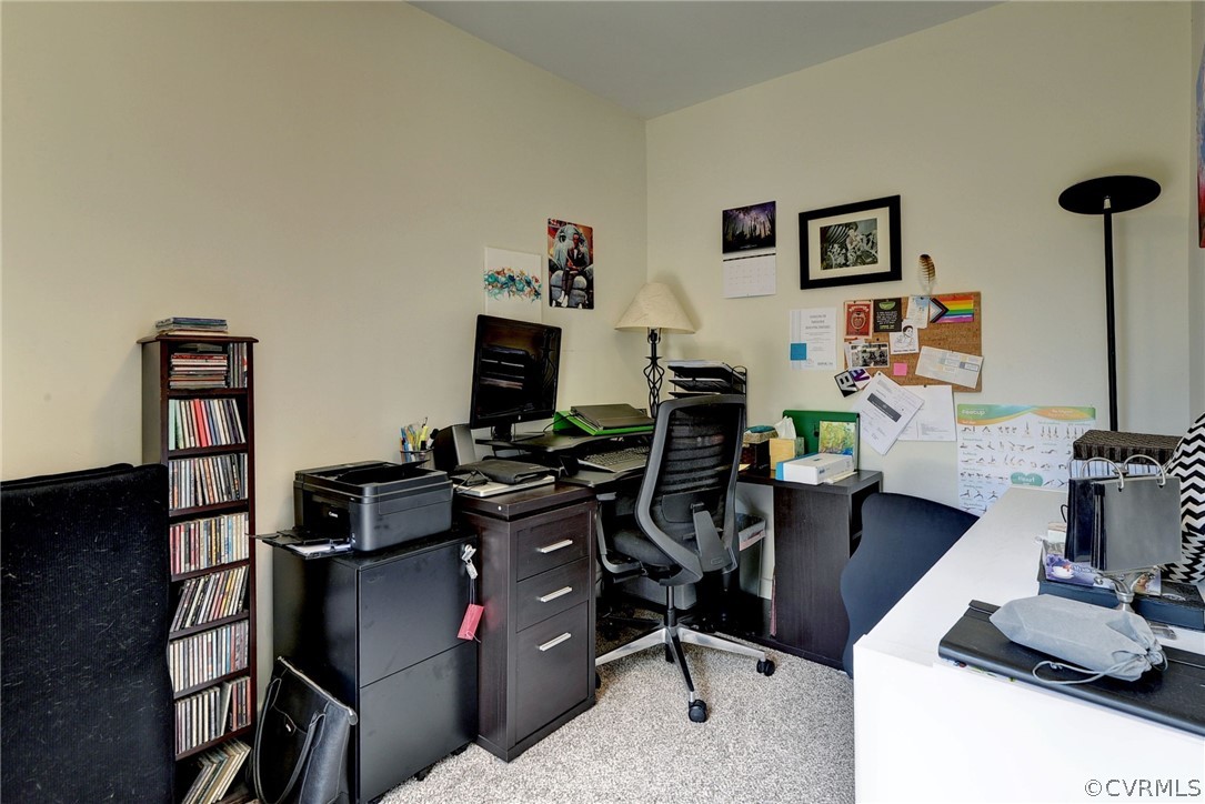 905 Lake Road Richmond, VA 23220 - Photo 42 of 50 a view of a workspace with furniture and a gate