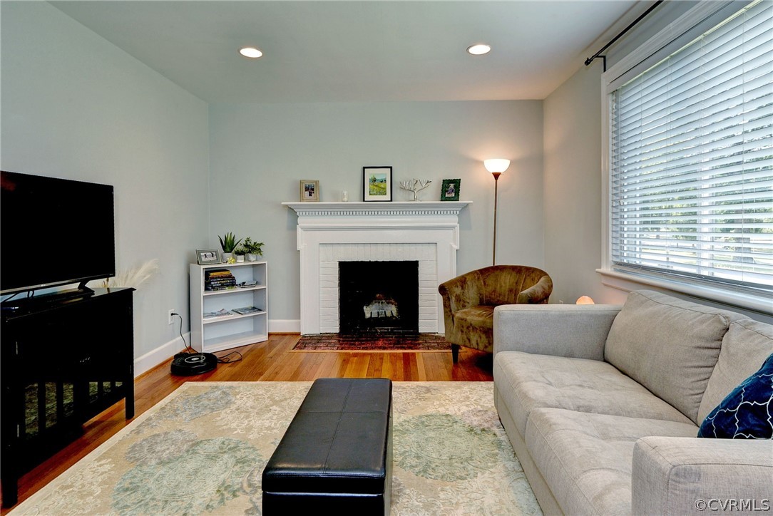 905 Lake Road Richmond, VA 23220 - Photo 9 of 50 a living room with furniture and a fireplace