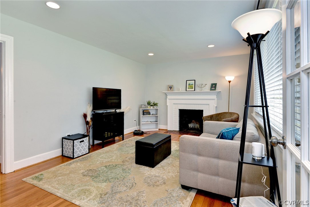 905 Lake Road Richmond, VA 23220 - Photo 10 of 50 a living room with furniture and a fireplace