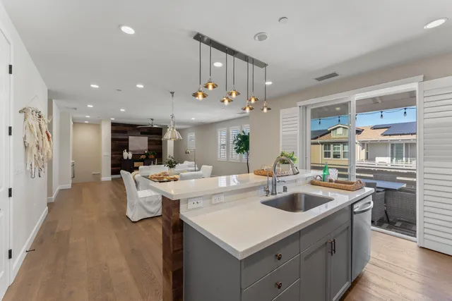 a bedroom with a bed a couch and a window