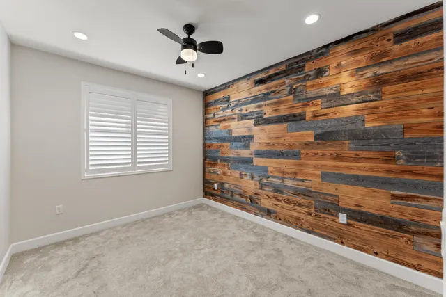 wooden floor in an empty room and a window
