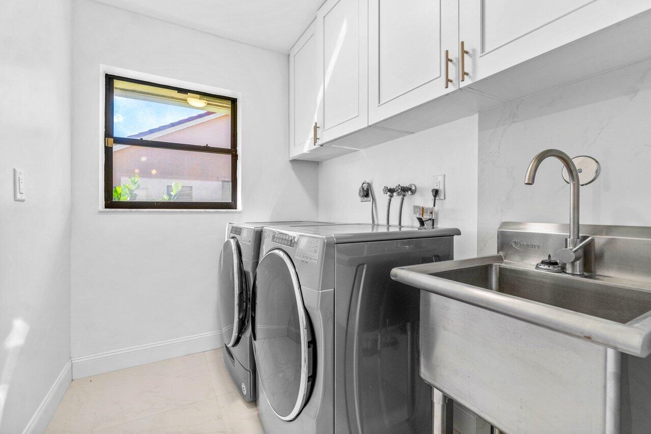 2683 Northwest 45th Street Boca Raton, FL 33434 - Photo 24 of 28 Laundry