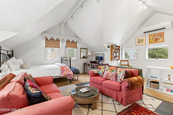 a living room with furniture and a couch