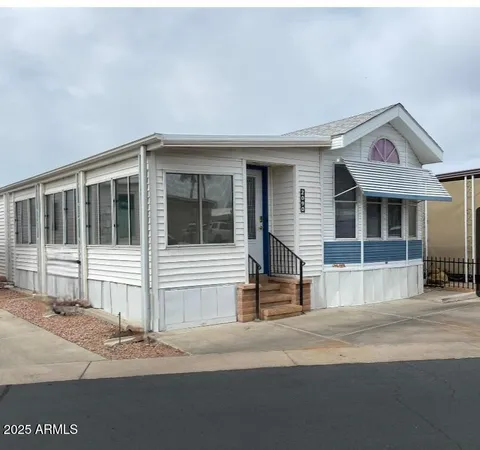 a view of a house with a patio