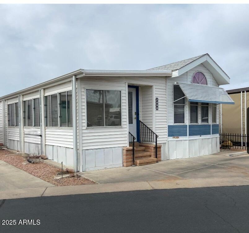 a view of a house with a patio