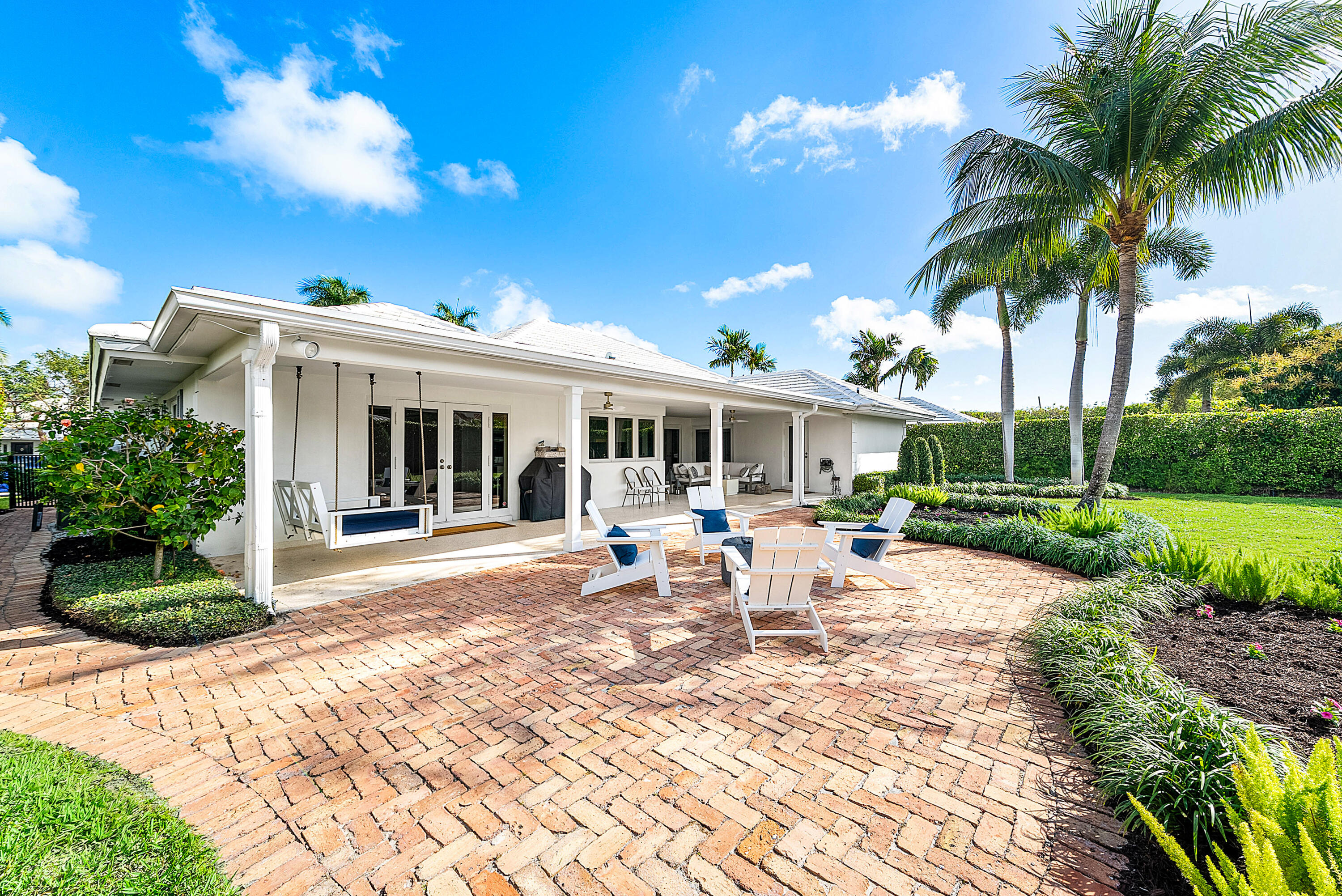 670 Elm Tree Lane Boca Raton, FL 33486 - Photo 13 of 44 a view of a house with backyard and sitting area
