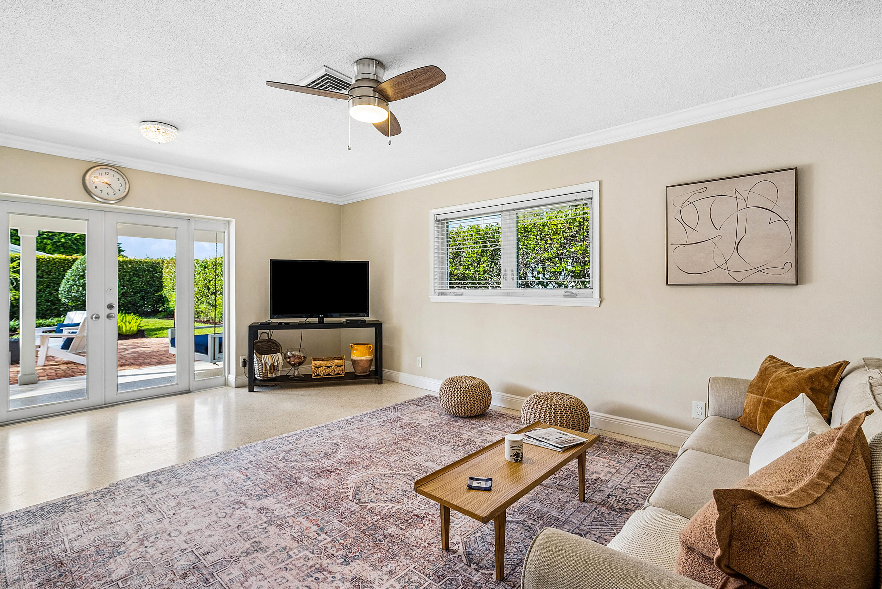670 Elm Tree Lane Boca Raton, FL 33486 - Photo 19 of 44 a living room with furniture and a flat screen tv