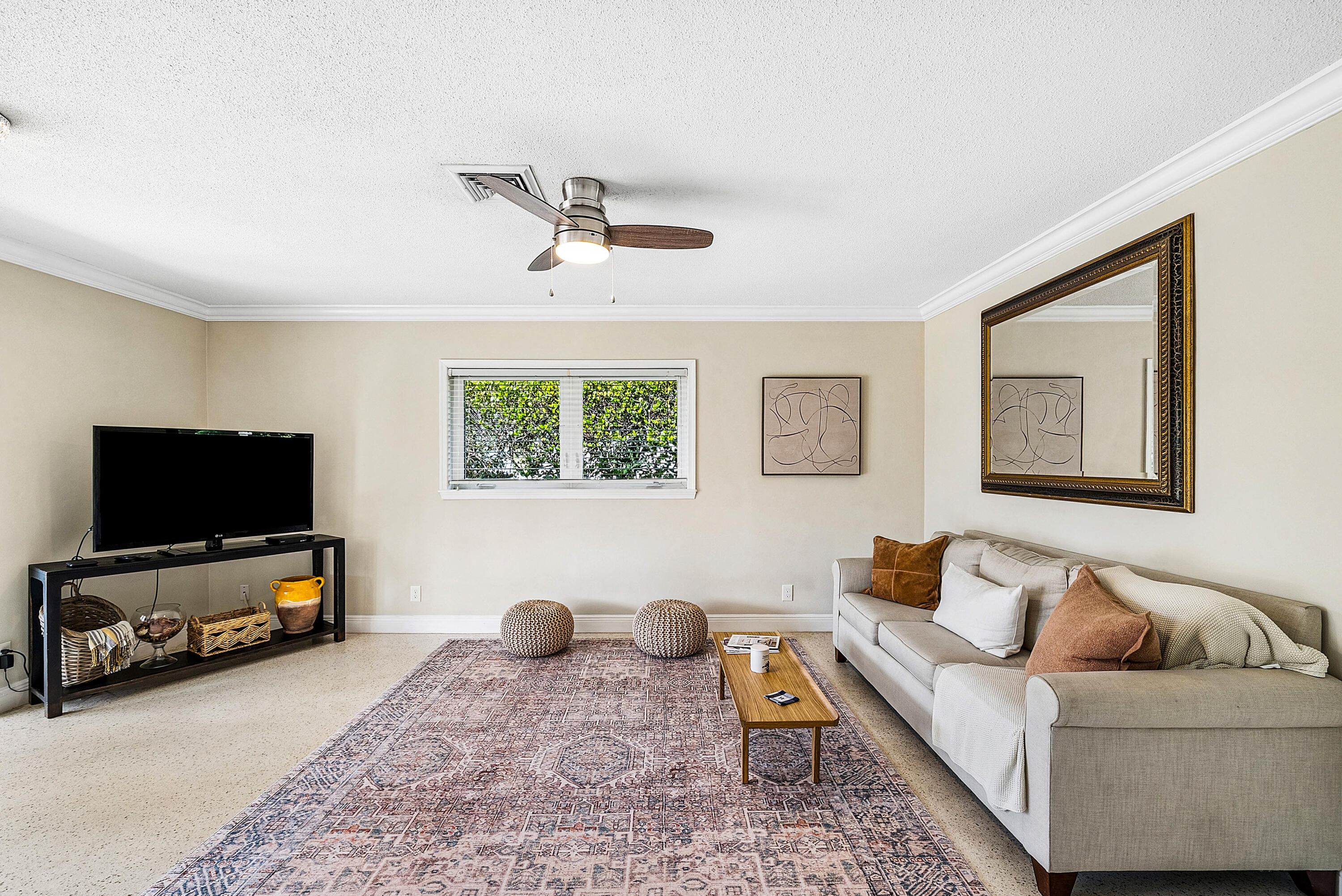 670 Elm Tree Lane Boca Raton, FL 33486 - Photo 20 of 44 a living room with furniture and a flat screen tv