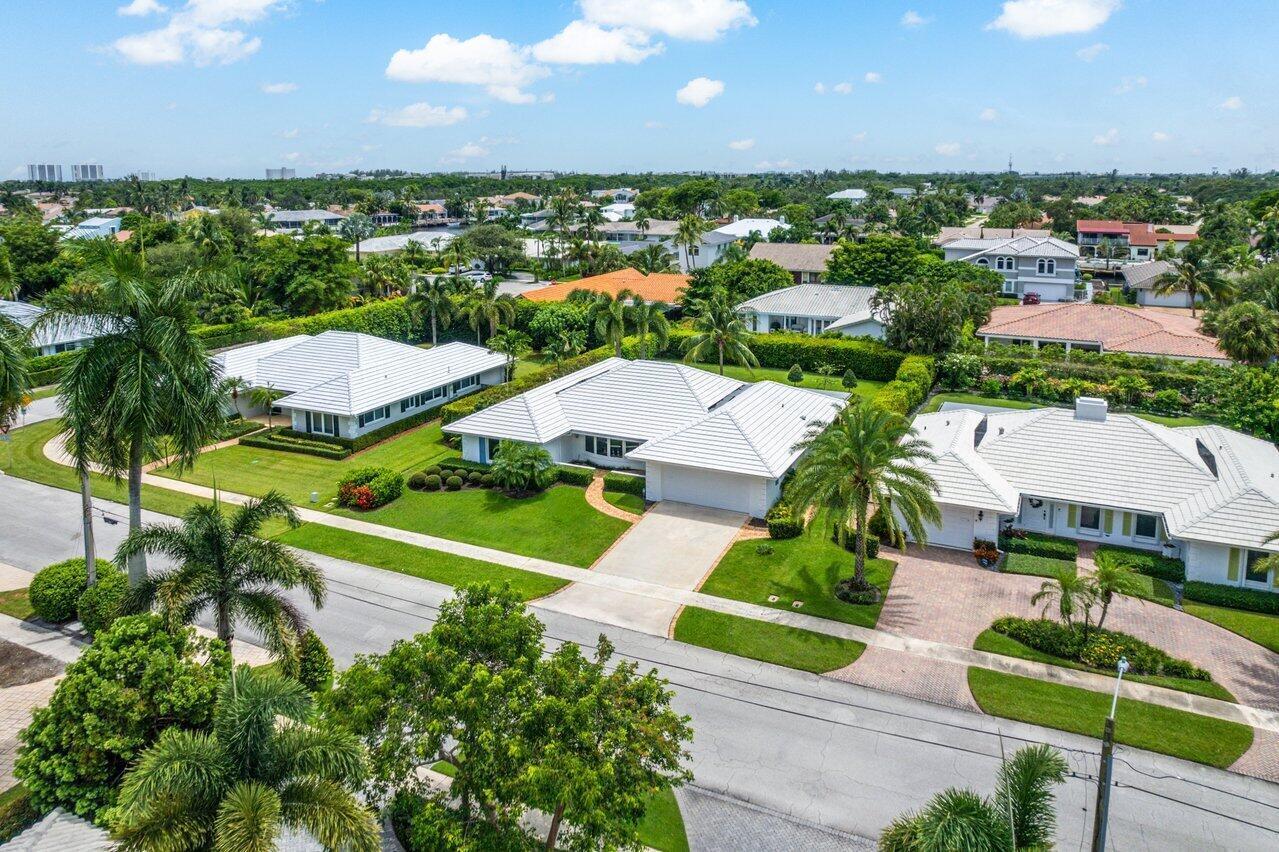 670 Elm Tree Lane Boca Raton, FL 33486 - Photo 37 of 44 an aerial view of residential houses with outdoor space and street view
