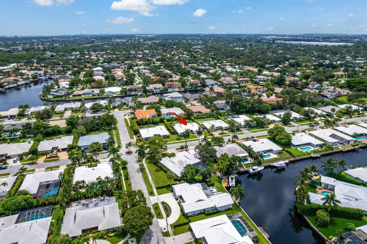670 Elm Tree Lane Boca Raton, FL 33486 - Photo 39 of 44 an aerial view of residential houses with outdoor space