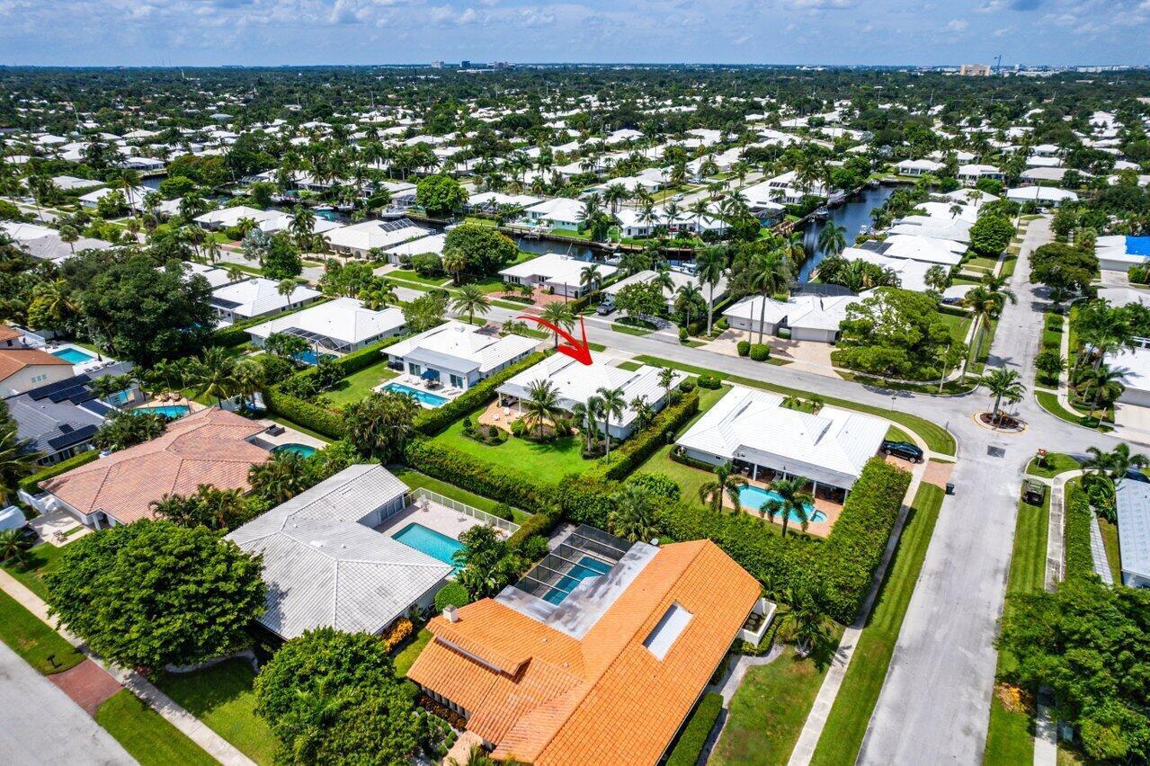 670 Elm Tree Lane Boca Raton, FL 33486 - Photo 41 of 44 an aerial view of residential houses with outdoor space