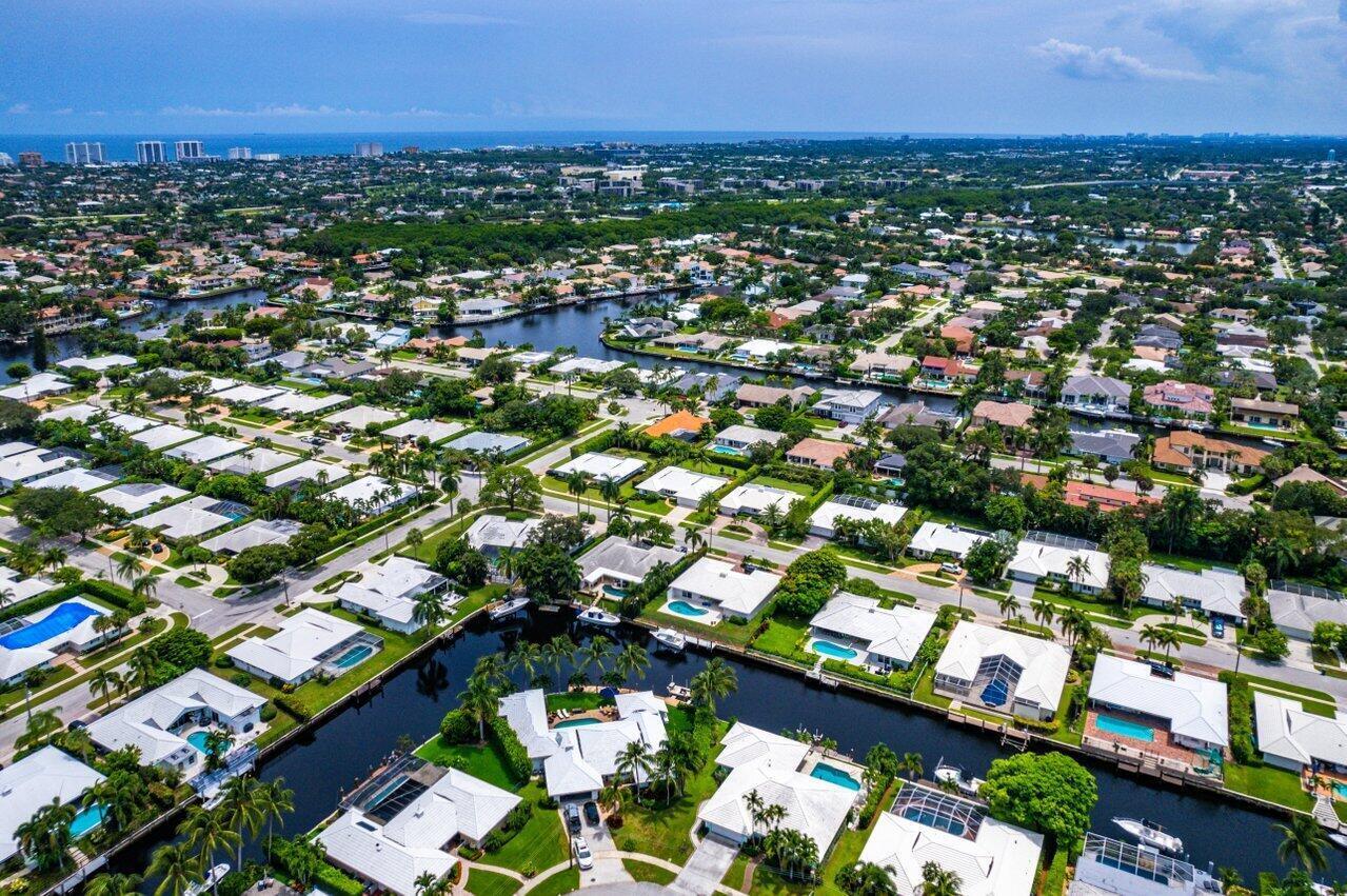 670 Elm Tree Lane Boca Raton, FL 33486 - Photo 43 of 44 an aerial view of residential houses with city view