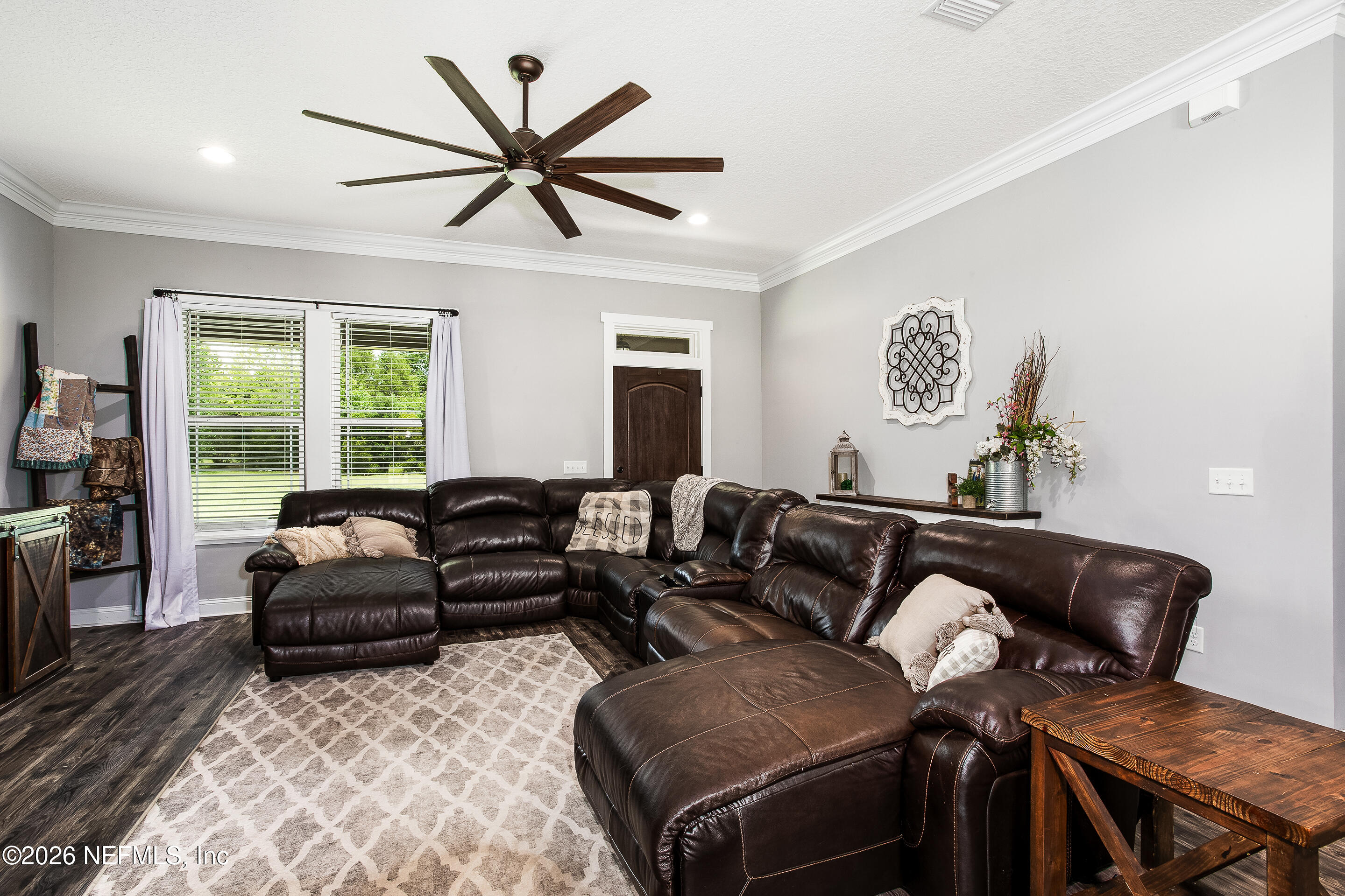 26575 Sheared Stokes Road Hilliard, FL 32046 - Photo 5 of 39 a living room with furniture