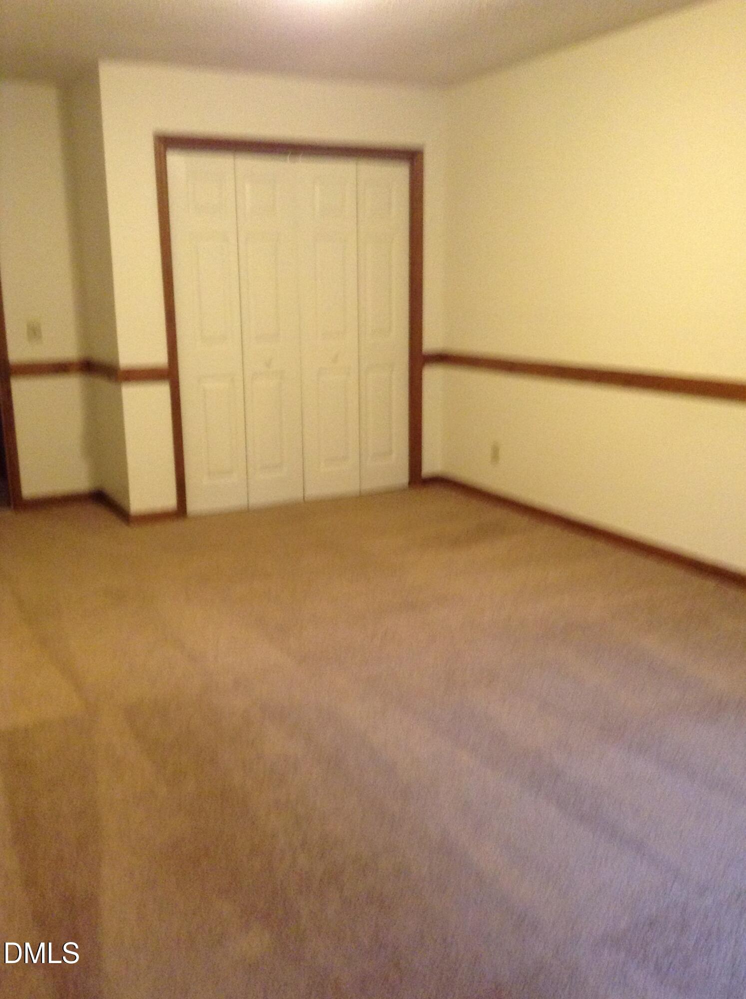 4302 Hunters Club Drive Raleigh, NC 27606 - Photo 5 of 9 Dowstairs Bedroom