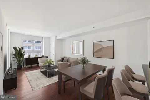 a view of a livingroom with furniture and window