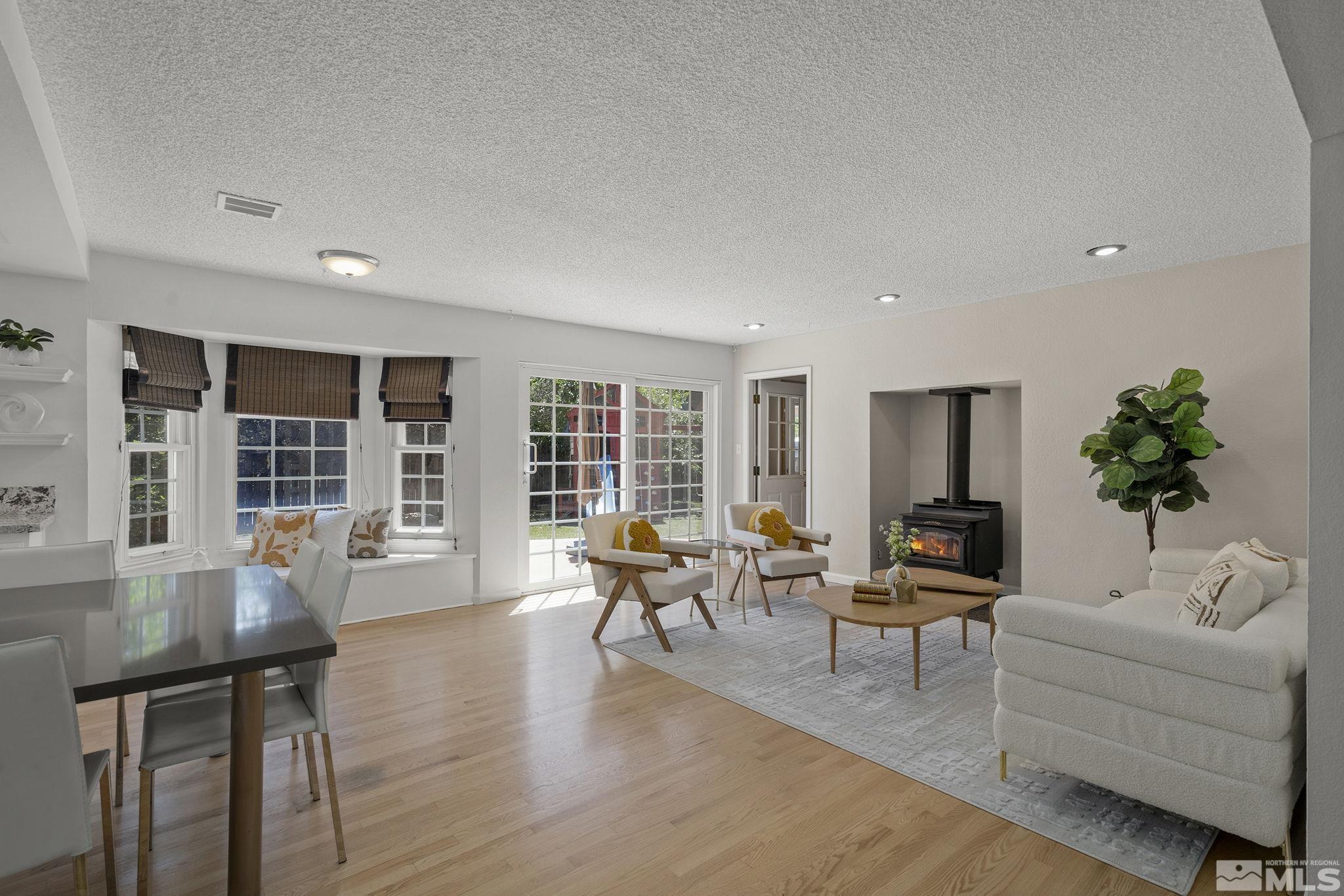 10055 Raintree Court Reno, NV 89511 - Photo 17 of 39 a living room with furniture and wooden floor
