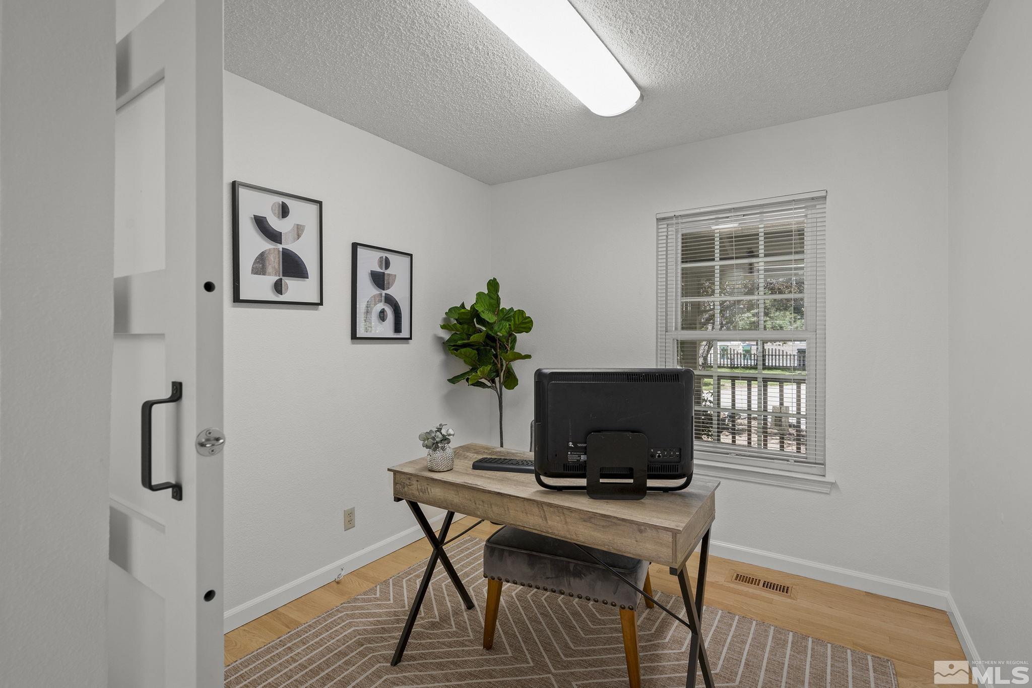 10055 Raintree Court Reno, NV 89511 - Photo 24 of 39 a view of a workspace with furniture