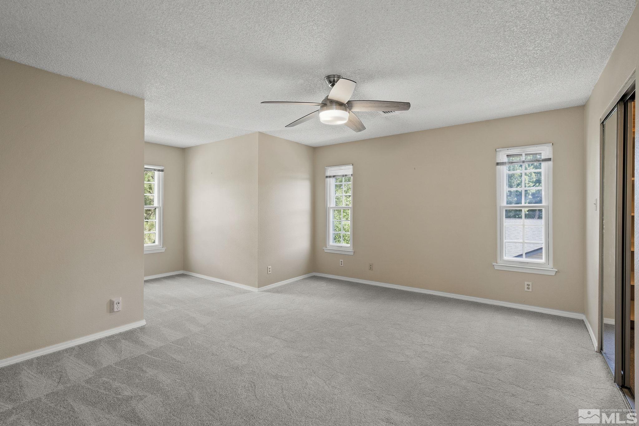 10055 Raintree Court Reno, NV 89511 - Photo 26 of 39 a view of an empty room with a window
