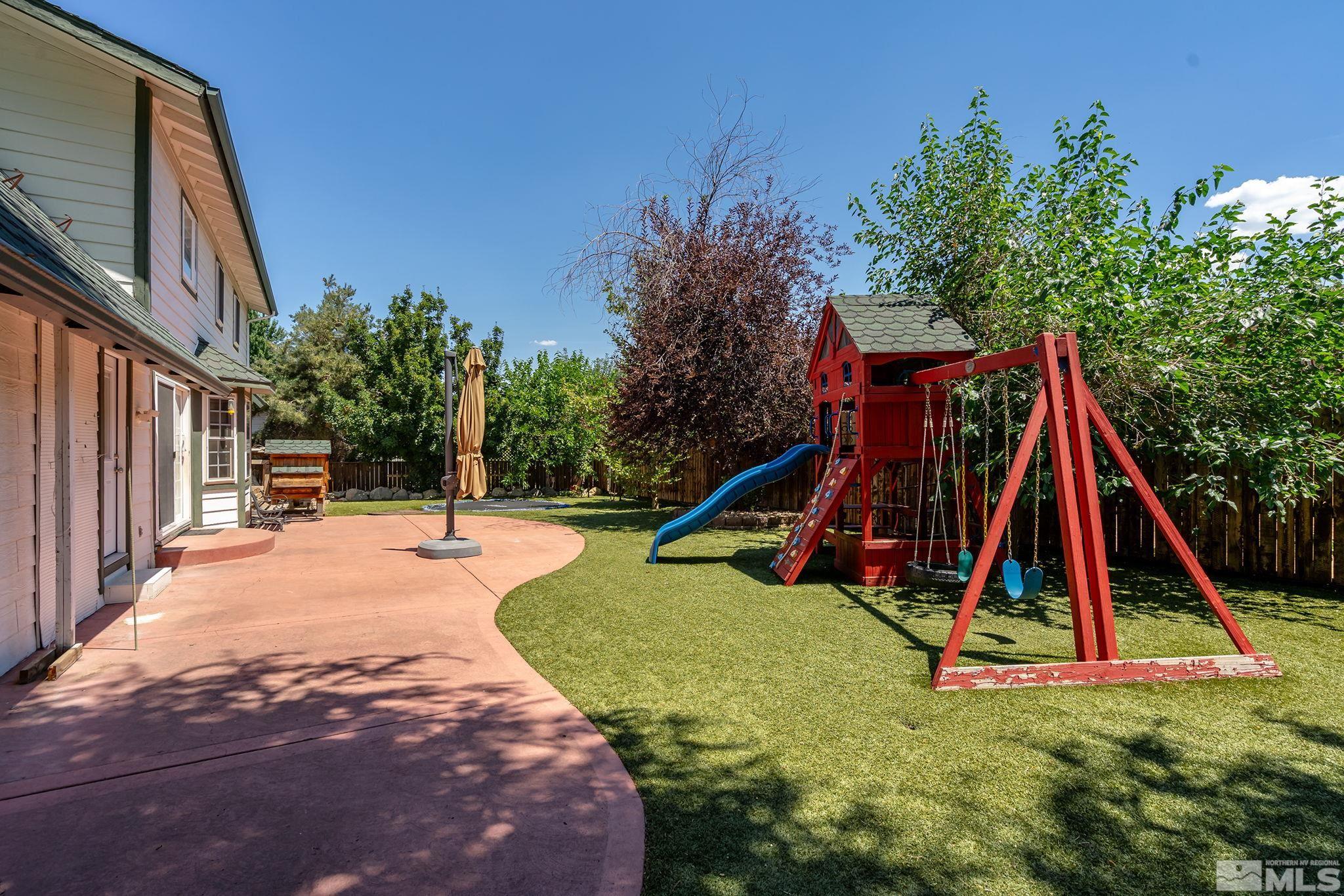 10055 Raintree Court Reno, NV 89511 - Photo 31 of 39 a view of a house with a park