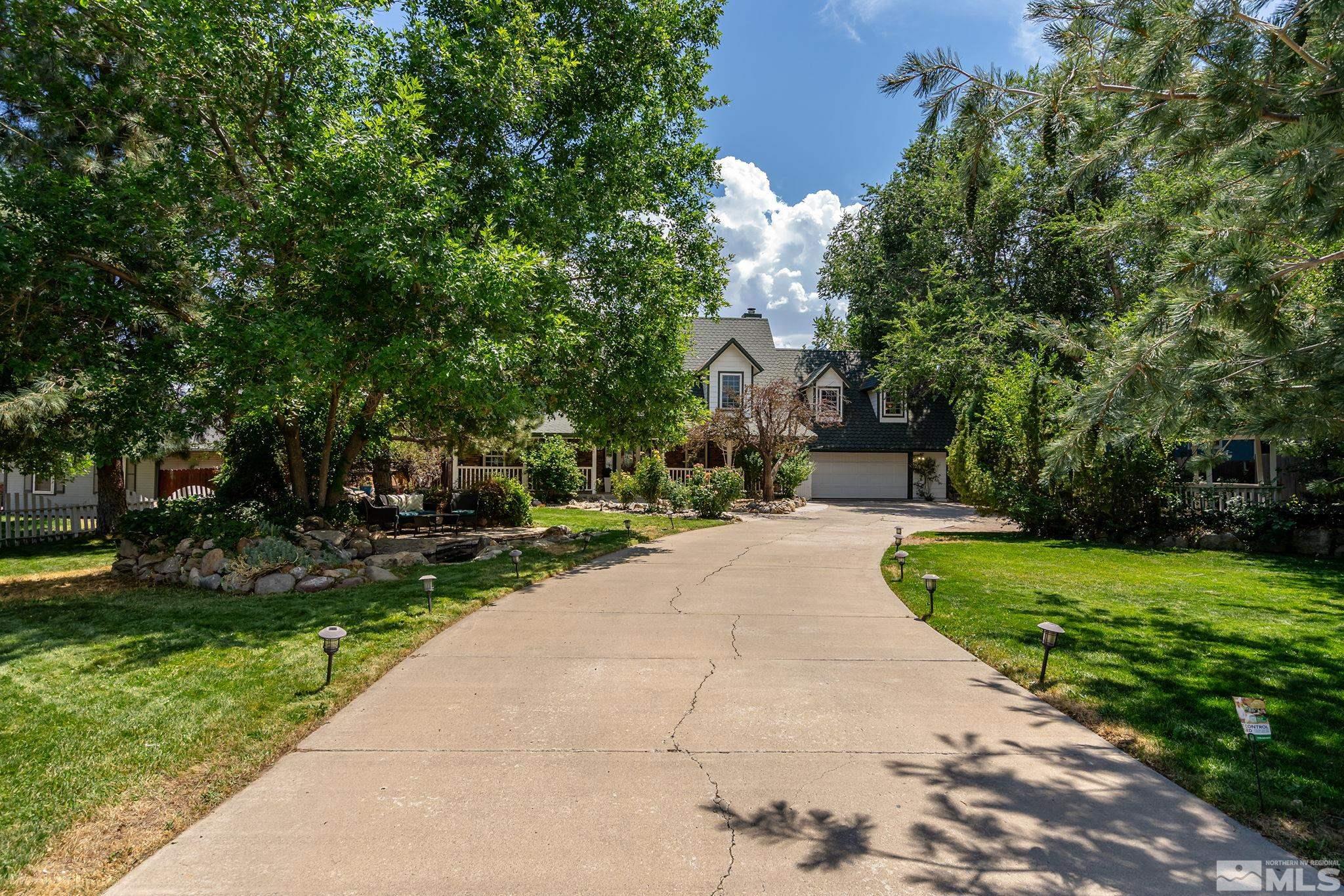 10055 Raintree Court Reno, NV 89511 - Photo 5 of 39 a view of a park with plants and trees