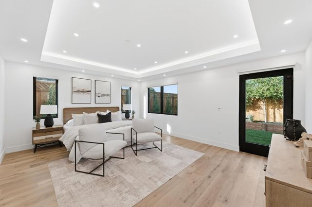 a bathroom with a shower and toilet